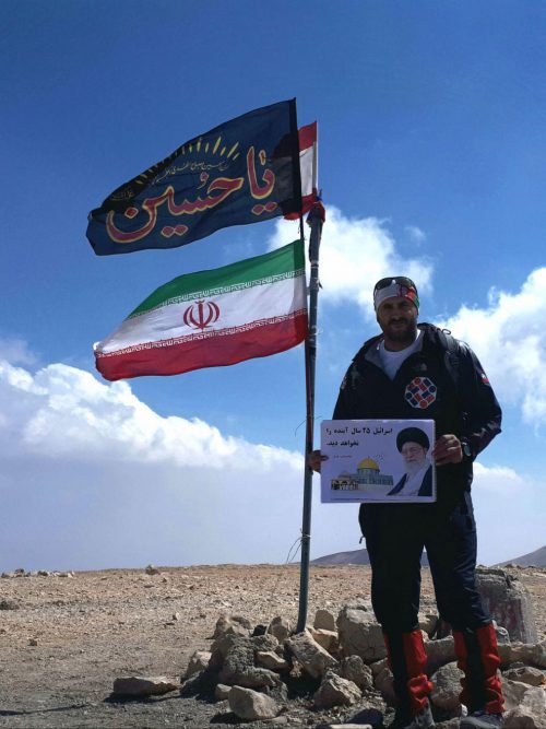 اهتزاز پرچم عاشورایی یاحسین ( ع) برفراز بلندترین قله در سرزمین مقاومت
